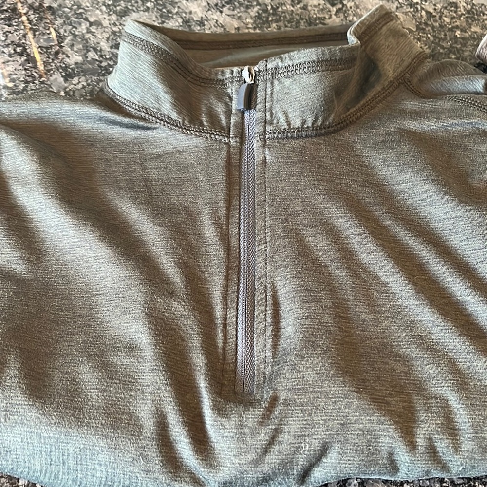 GH Bass dark green pullover moisture wicking fabric.